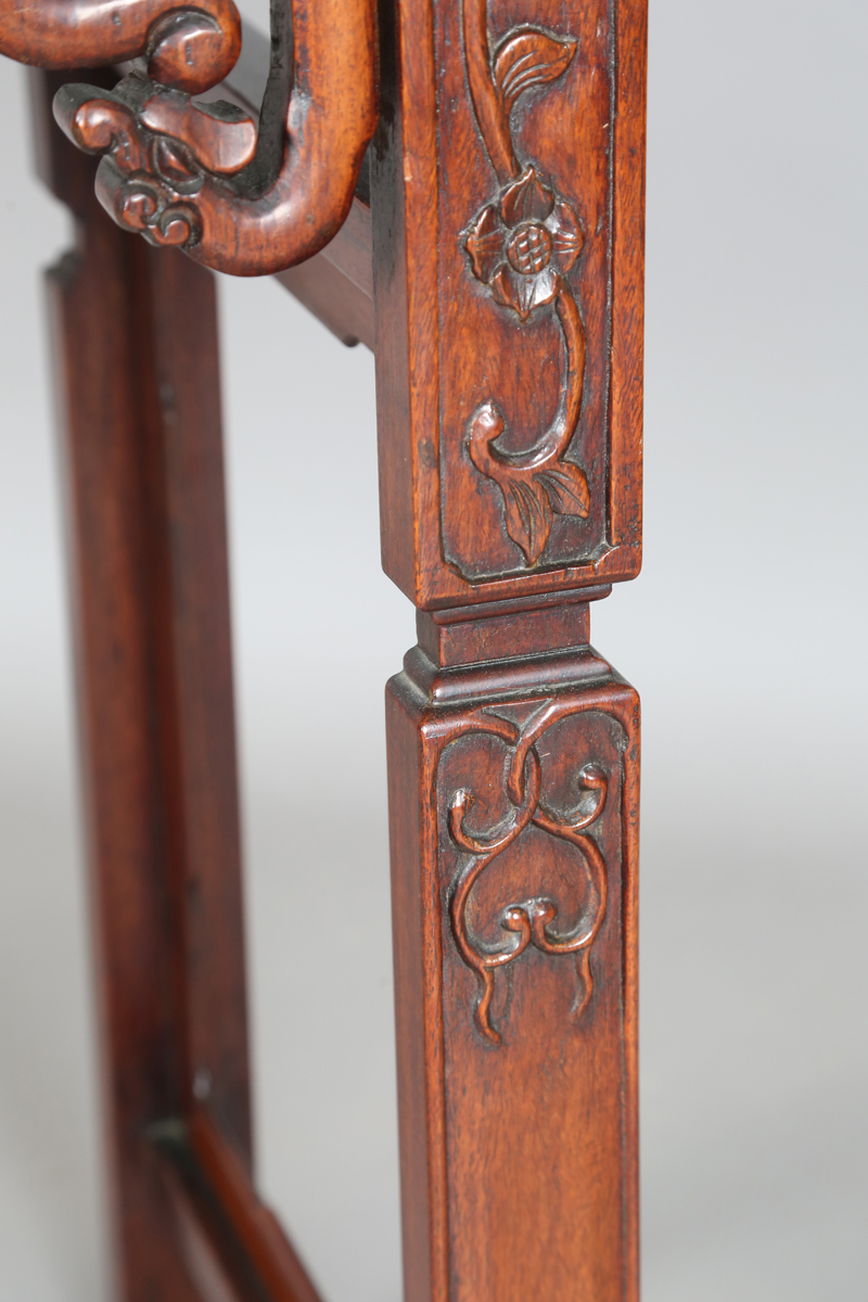 A Chinese hardwood altar table, 20th century, the rectangular panelled top with curved ends, the - Image 19 of 28