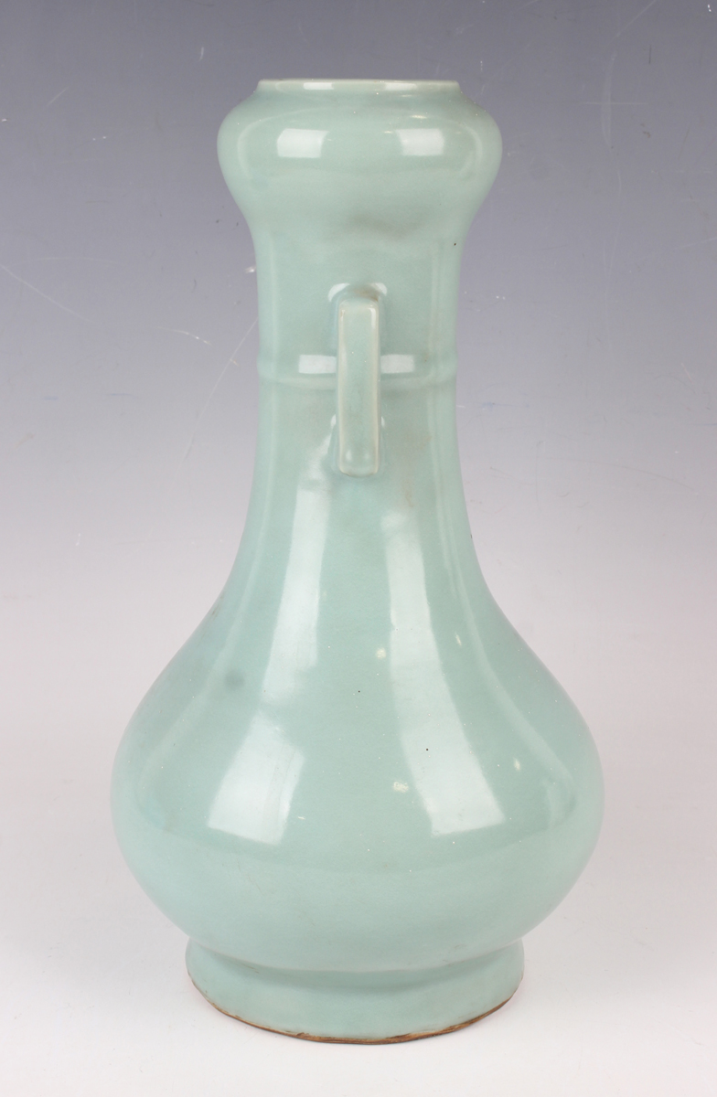 A Chinese celadon glazed porcelain bottle vase, probably late Qing dynasty, the pear form body - Image 4 of 6