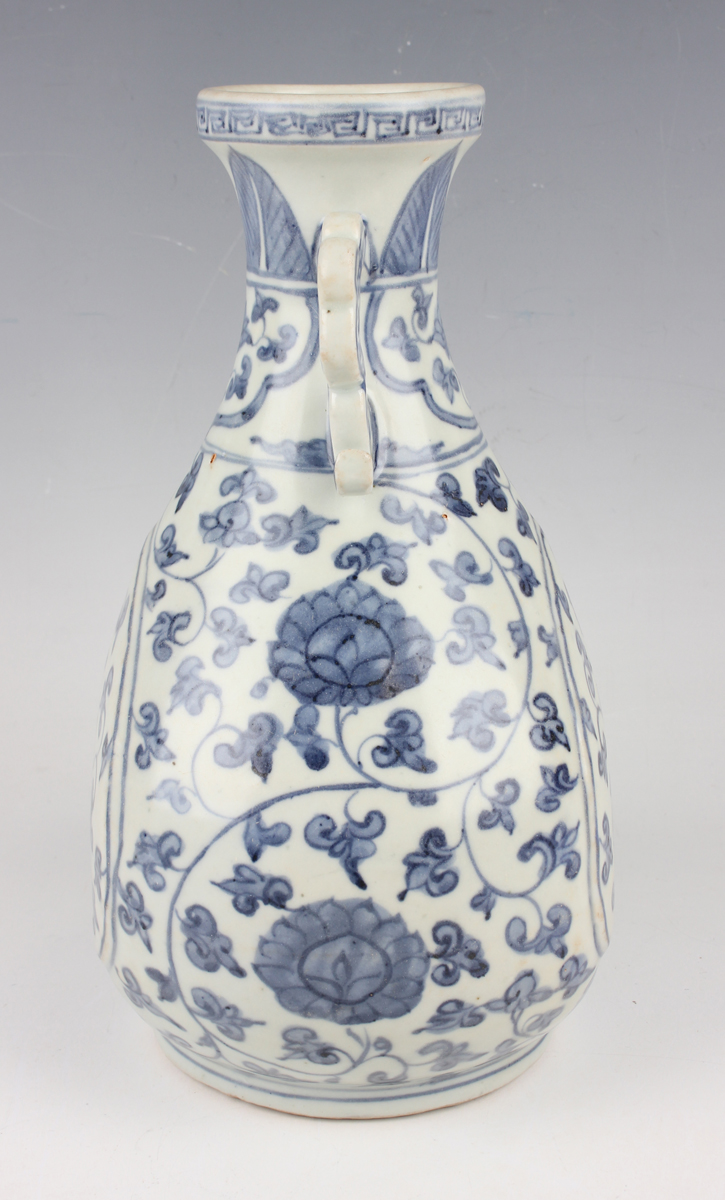 A Chinese Ming-style blue and white porcelain vase, the pear-form body painted with lotus and - Image 5 of 7