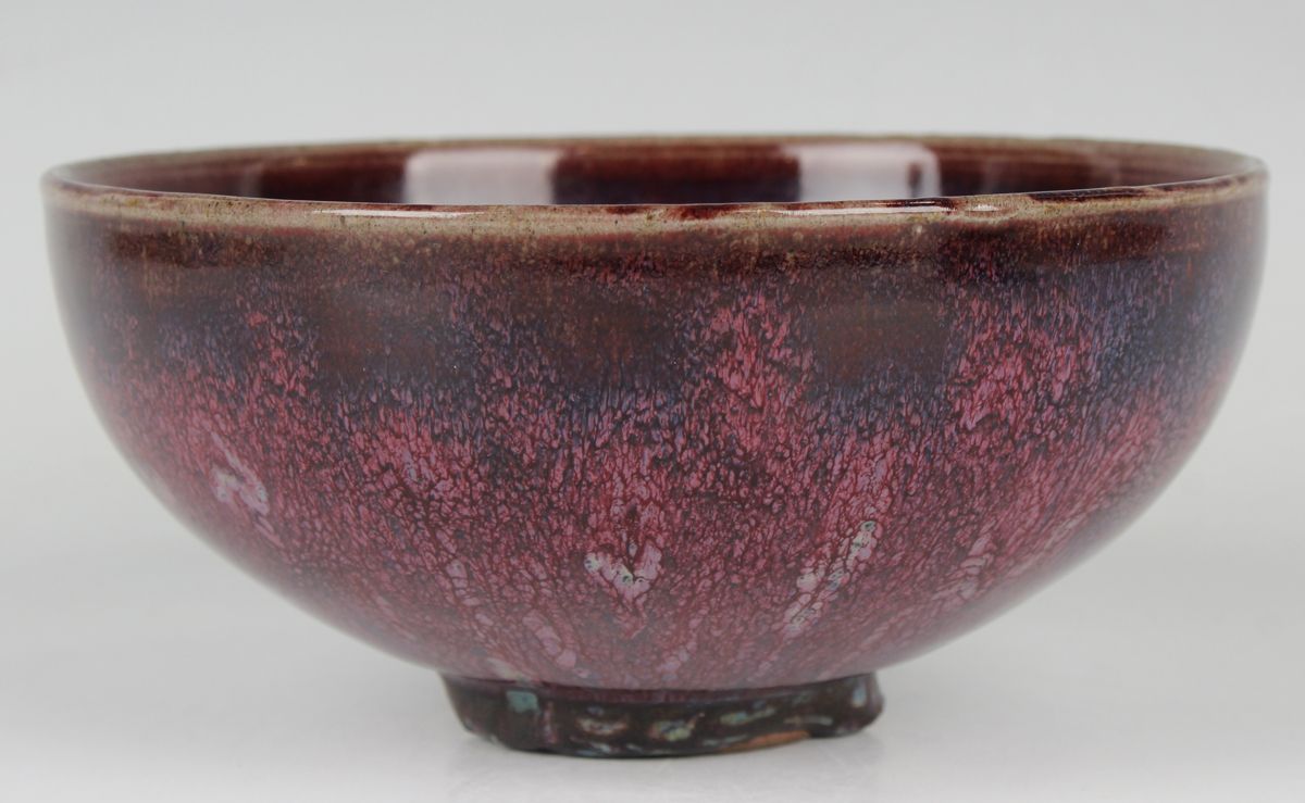 A Chinese flambé glazed porcelain bowl, Qing dynasty, the rounded sides rising to an everted rim - Image 4 of 18