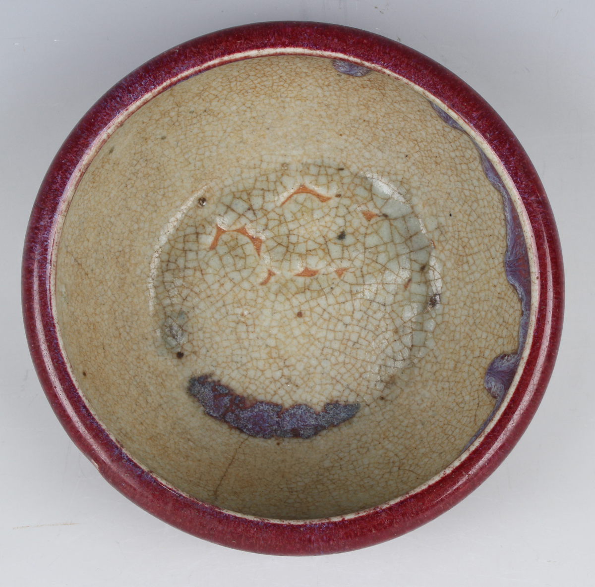 A Chinese flambé glazed porcelain bowl, Qing dynasty, the rounded sides rising to an everted rim - Image 10 of 18