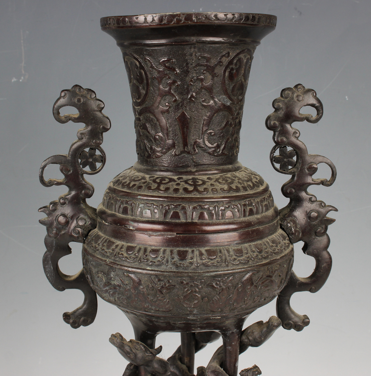 A pair of Japanese brown patinated bronze two-handled vases and integral stands, Meiji period, - Image 9 of 17