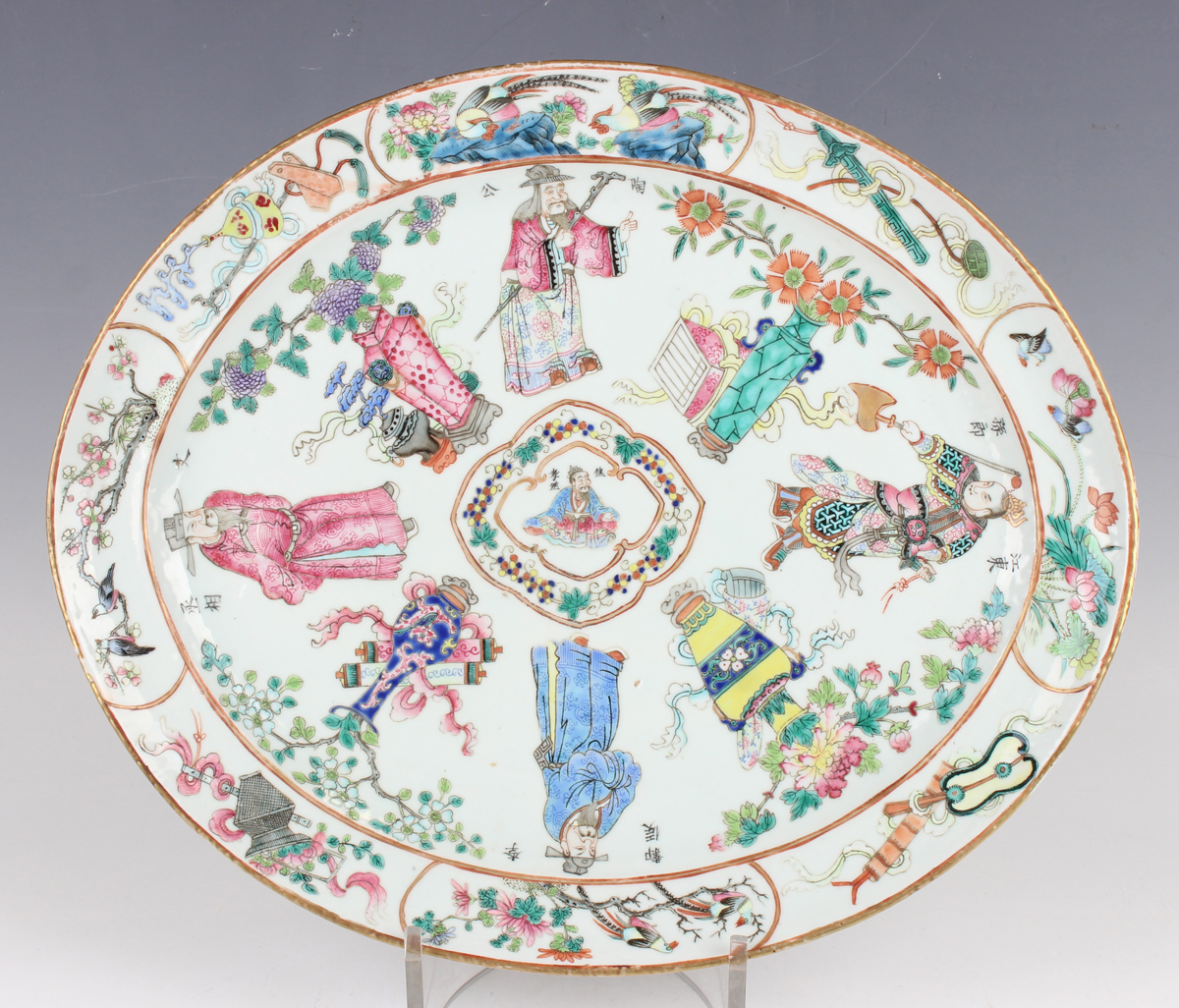 A Chinese Canton famille rose porcelain oval meat dish, mid-19th century, painted with four