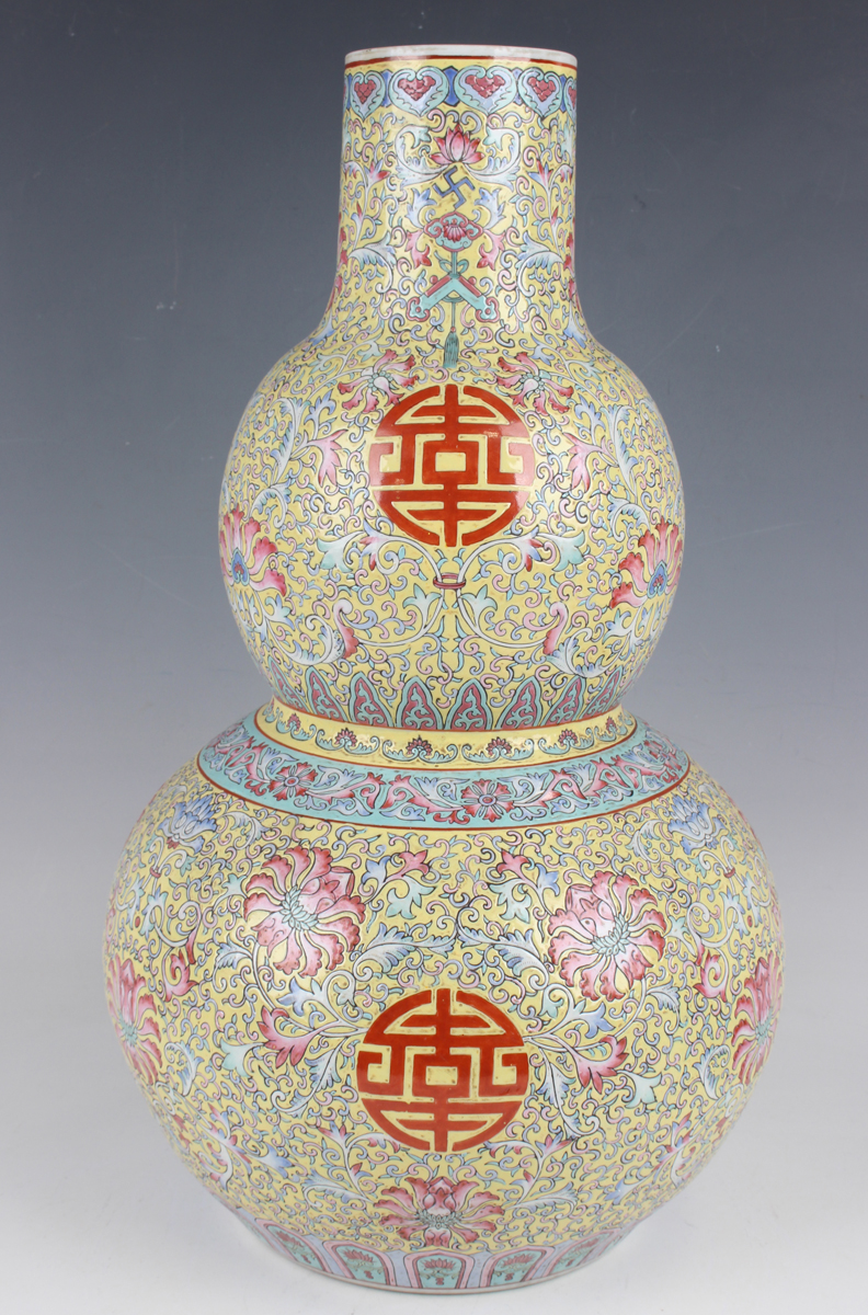 A Chinese famille rose enamelled yellow ground porcelain double gourd shaped vase, mark of - Image 10 of 12