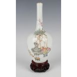 A Chinese Qianjiangcai enamelled porcelain bottle vase, probably Republic period, the ovoid body and