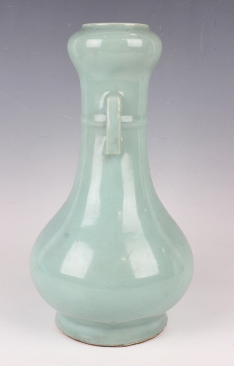 A Chinese celadon glazed porcelain bottle vase, probably late Qing dynasty, the pear form body - Image 6 of 6