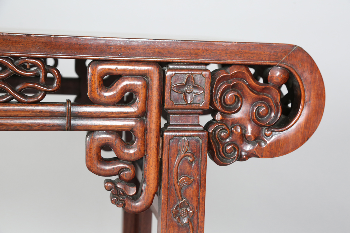 A Chinese hardwood altar table, 20th century, the rectangular panelled top with curved ends, the - Image 20 of 28