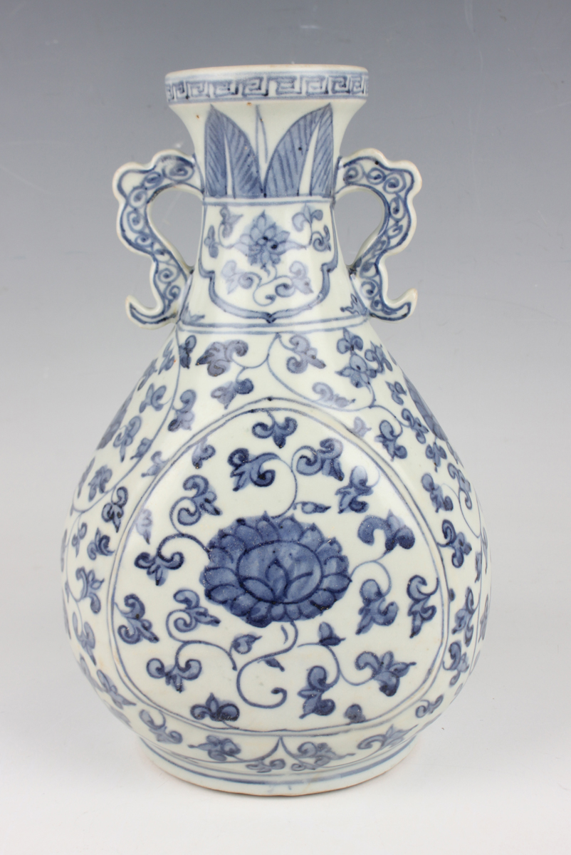 A Chinese Ming-style blue and white porcelain vase, the pear-form body painted with lotus and - Image 6 of 7