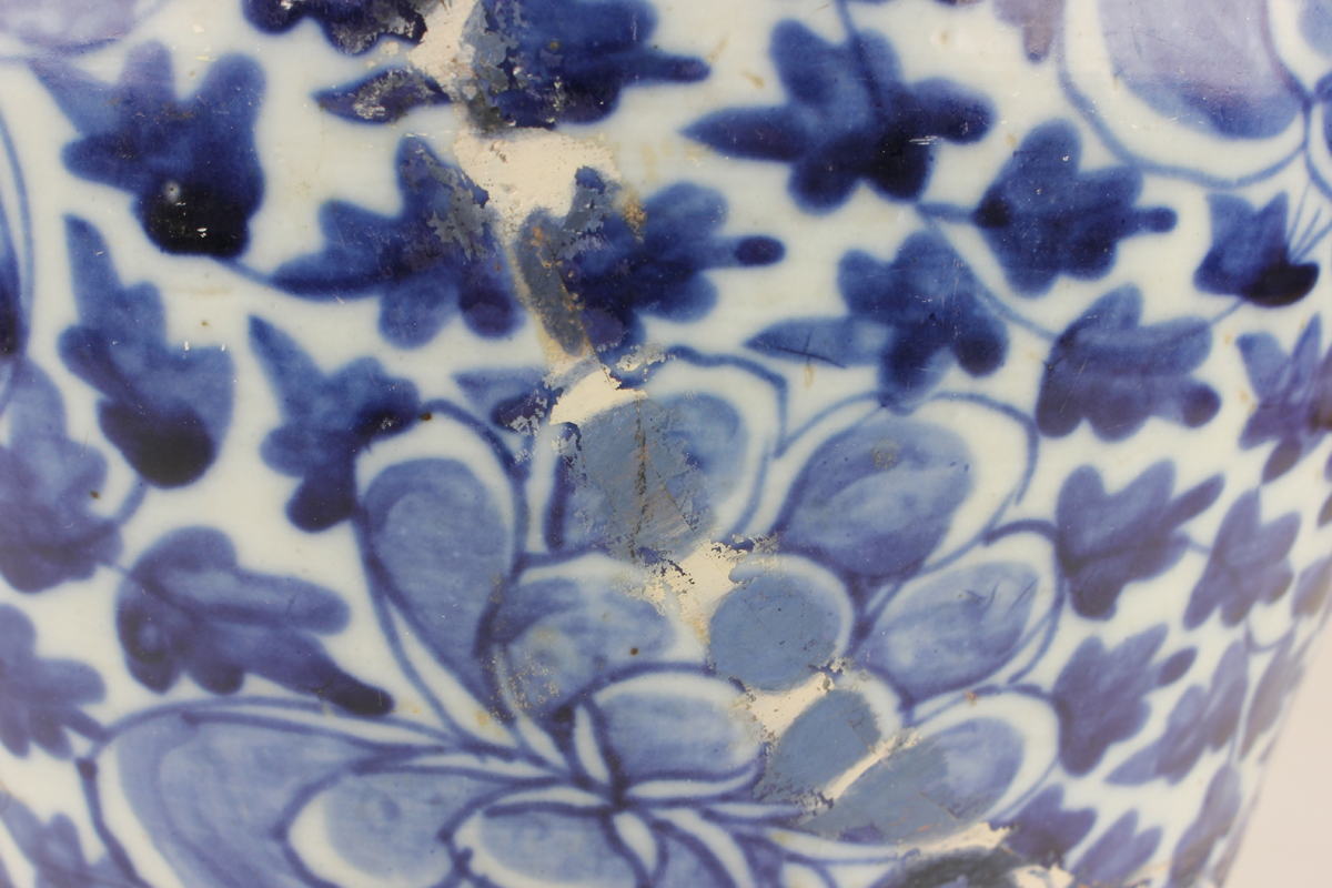 A Chinese blue and white porcelain vase, late 19th century, of baluster form, painted with flowers - Image 11 of 17