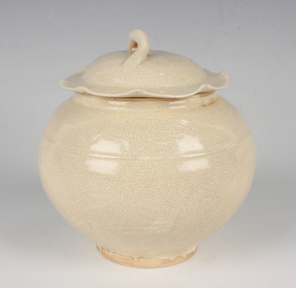 A small group of Chinese pottery, 20th century or later, including a Song style cream glazed jar and - Image 24 of 27