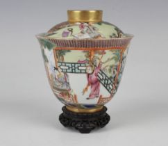 A Chinese famille rose porcelain bowl and cover, mark of Qianlong but probably later Qing dynasty,