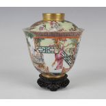 A Chinese famille rose porcelain bowl and cover, mark of Qianlong but probably later Qing dynasty,