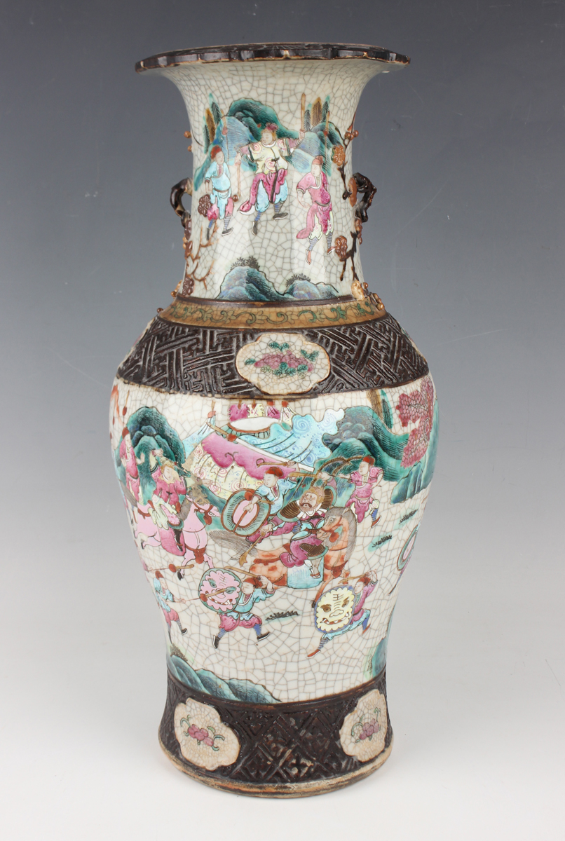 A Chinese famille rose crackle glazed porcelain vase, early 20th century, the baluster body