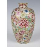 A Chinese famille rose millefleurs porcelain vase, mark of Daoguang but later Qing dynasty, the