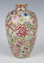 A Chinese famille rose millefleurs porcelain vase, mark of Daoguang but later Qing dynasty, the