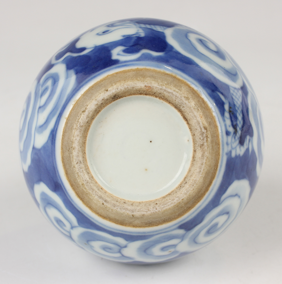 A Chinese blue and white porcelain bottle vase, Qing dynasty, painted with a dragon emerging through - Image 11 of 16