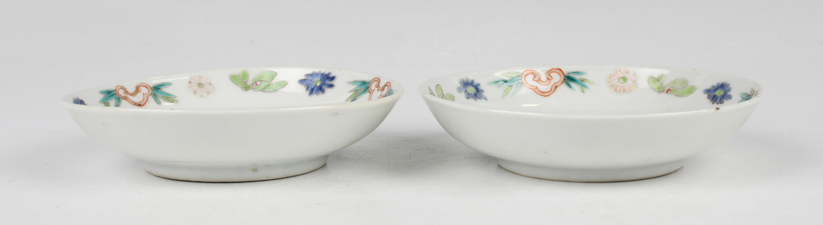 A pair of Chinese famille rose porcelain saucer dishes, 20th century, each painted with a bat and - Image 3 of 9