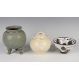 A small group of Chinese pottery, 20th century or later, including a Song style cream glazed jar and
