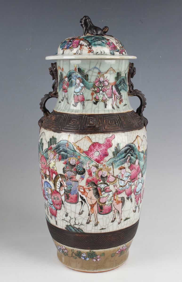 A pair of Chinese famille rose crackle glazed porcelain vases and covers, late 19th century, each - Image 11 of 26
