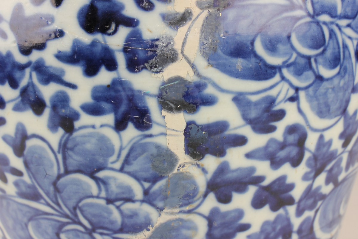 A Chinese blue and white porcelain vase, late 19th century, of baluster form, painted with flowers - Image 8 of 17