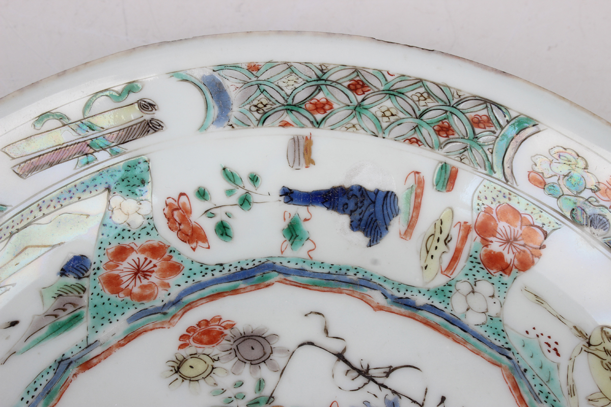 A Chinese famille verte export porcelain saucer dish, Kangxi period, the centre painted with a - Image 11 of 13