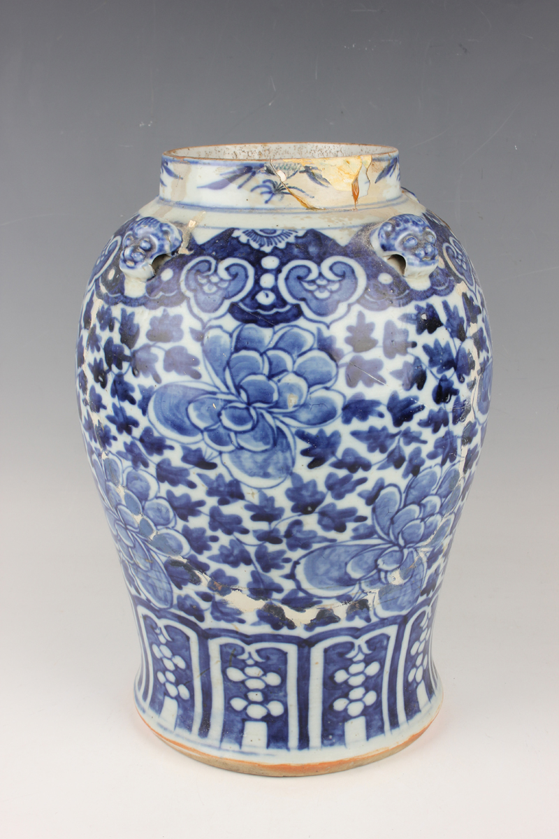 A Chinese blue and white porcelain vase, late 19th century, of baluster form, painted with flowers