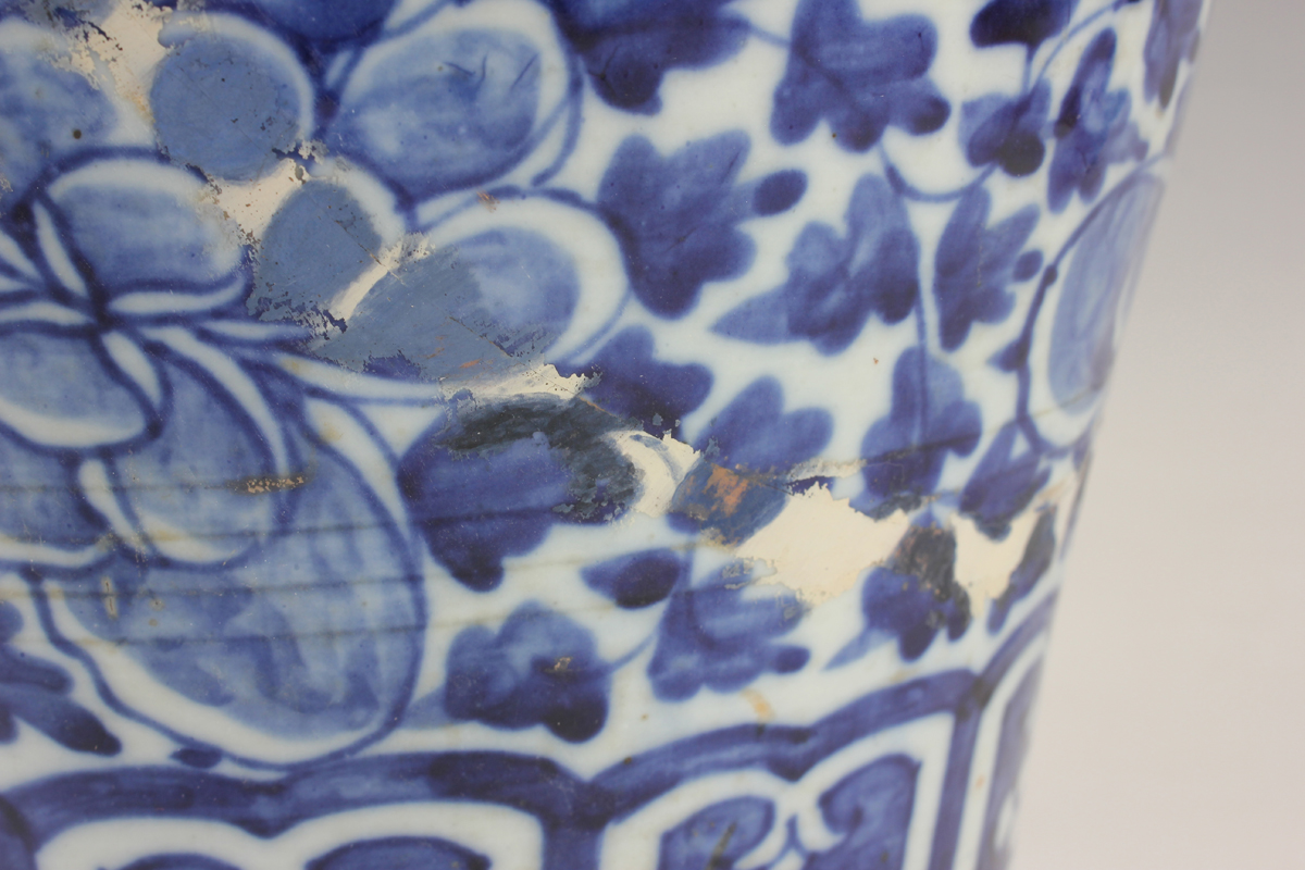 A Chinese blue and white porcelain vase, late 19th century, of baluster form, painted with flowers - Image 10 of 17