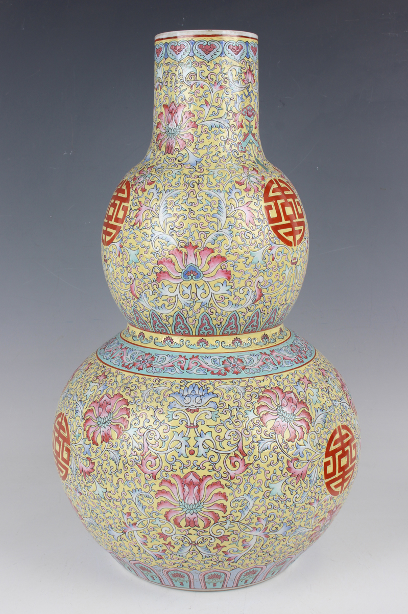 A Chinese famille rose enamelled yellow ground porcelain double gourd shaped vase, mark of - Image 11 of 12