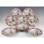 A set of twelve Chinese famille rose export porcelain octagonal soup plates, Qianlong period, each