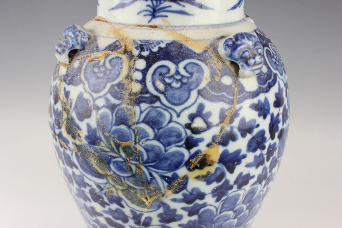 A Chinese blue and white porcelain vase, late 19th century, of baluster form, painted with flowers - Image 2 of 17