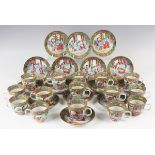 A set of fifteen Chinese Canton famille rose porcelain coffee cups and saucers, mid-19th century,