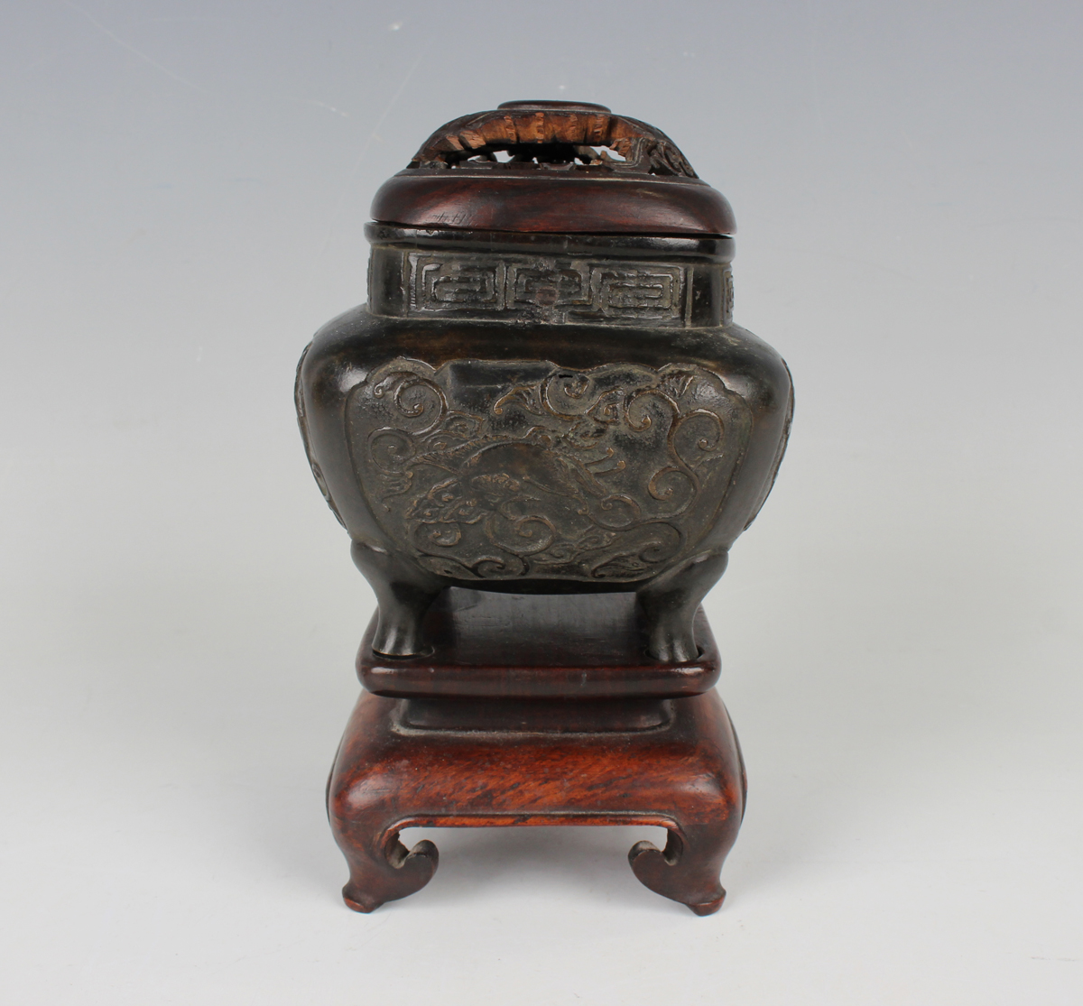 A Chinese brown patinated bronze censer of rounded square form, the body cast with fenghuang panels, - Image 9 of 9