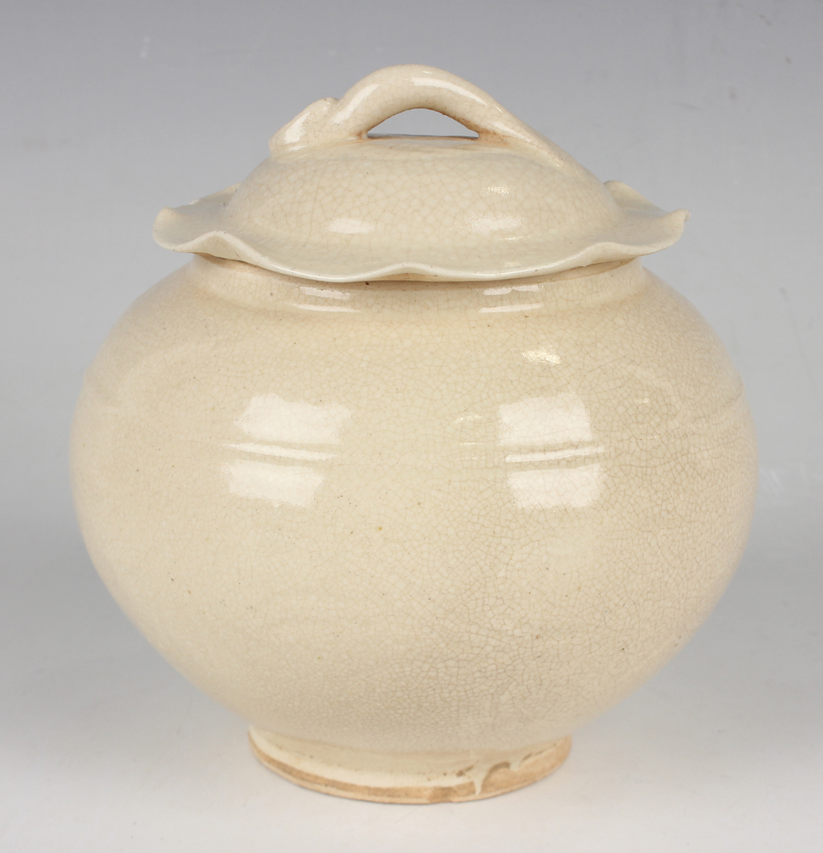 A small group of Chinese pottery, 20th century or later, including a Song style cream glazed jar and - Image 25 of 27