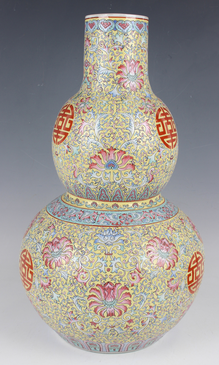 A Chinese famille rose enamelled yellow ground porcelain double gourd shaped vase, mark of - Image 9 of 12