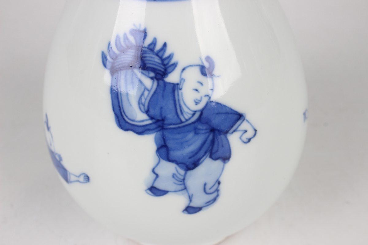 A Chinese blue and white porcelain bottle vase, Kangxi period, the ovoid body and flared narrow neck - Image 6 of 9