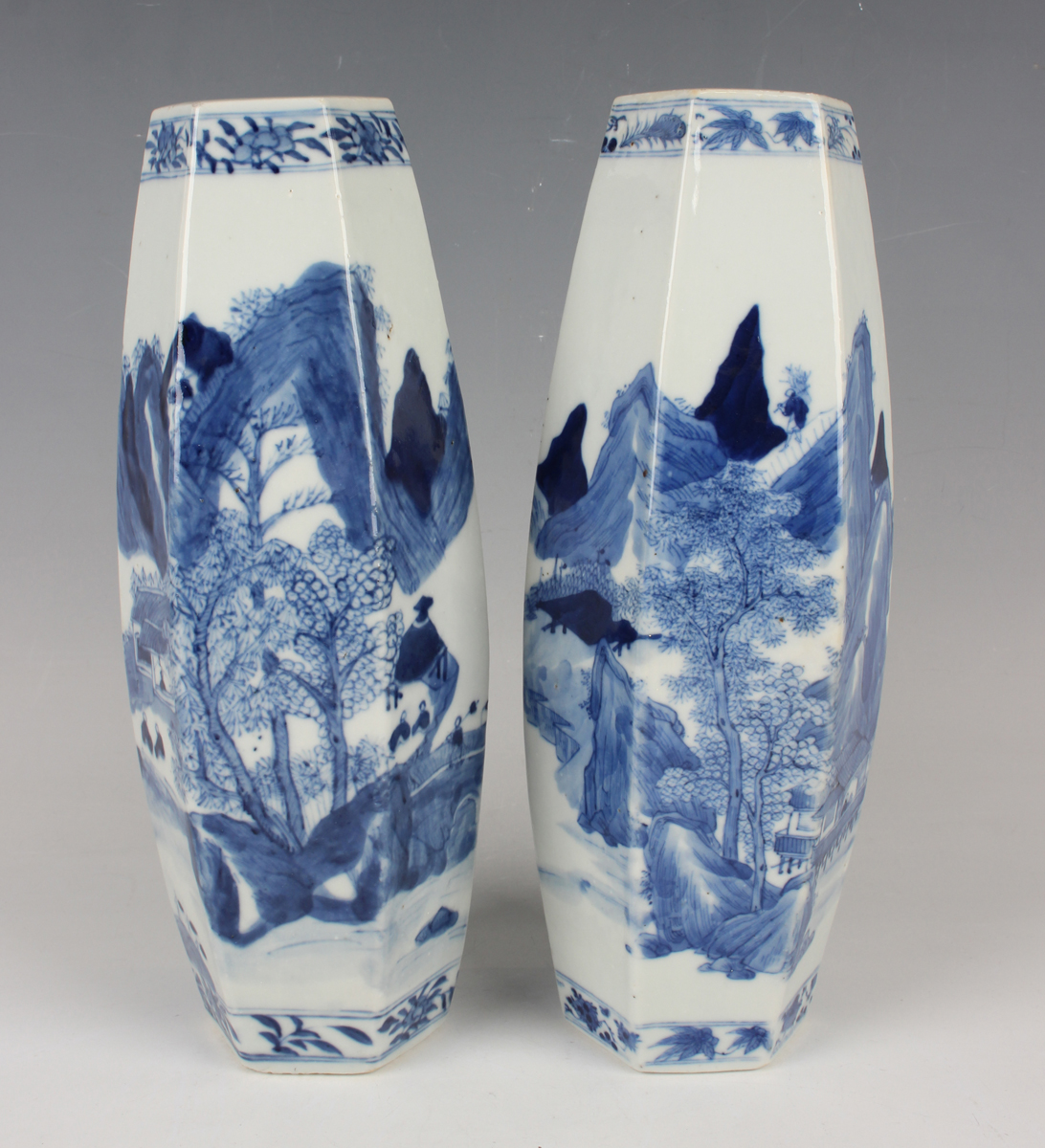A pair of Chinese blue and white porcelain vases, mark of Kangxi but late 19th century, each of