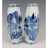 A pair of Chinese blue and white porcelain vases, mark of Kangxi but late 19th century, each of