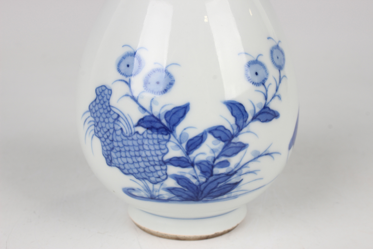 A Chinese blue and white porcelain bottle vase, Kangxi period, the ovoid body and flared narrow neck - Image 3 of 9