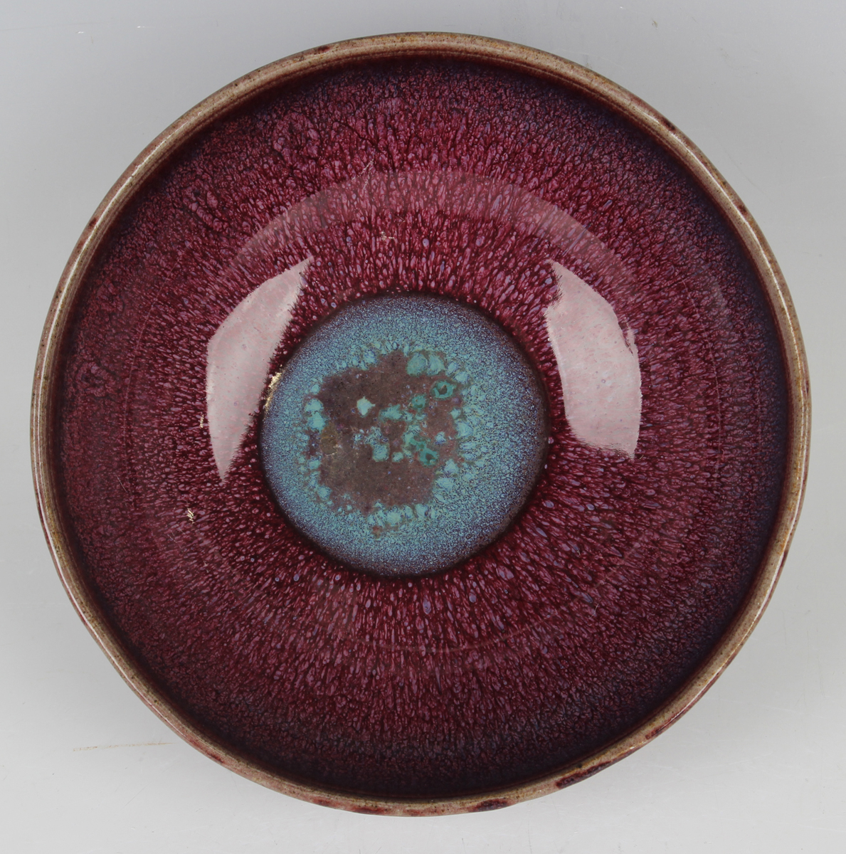 A Chinese flambé glazed porcelain bowl, Qing dynasty, the rounded sides rising to an everted rim - Image 3 of 18