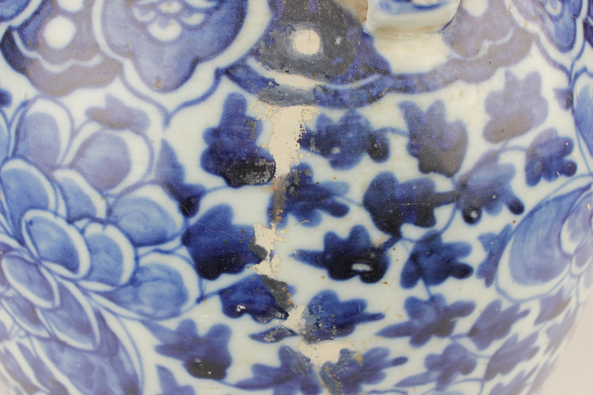 A Chinese blue and white porcelain vase, late 19th century, of baluster form, painted with flowers - Image 12 of 17