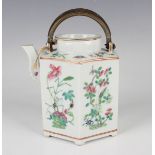 A Chinese famille rose porcelain teapot and cover, late Qing dynasty, of hexagonal form, painted