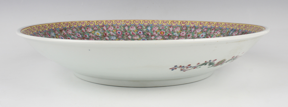 A Chinese famille rose porcelain circular charger dish, mark of Qianlong but 20th century, painted - Image 2 of 7