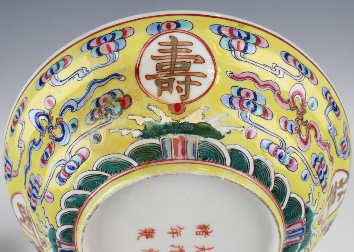 A Chinese famille rose enamelled yellow ground porcelain bowl and matched cover, mark of Guangxu and - Image 4 of 16