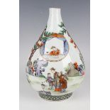 A Chinese famille verte and floral incised porcelain bottle vase, mark of Xuande but Qing dynasty,