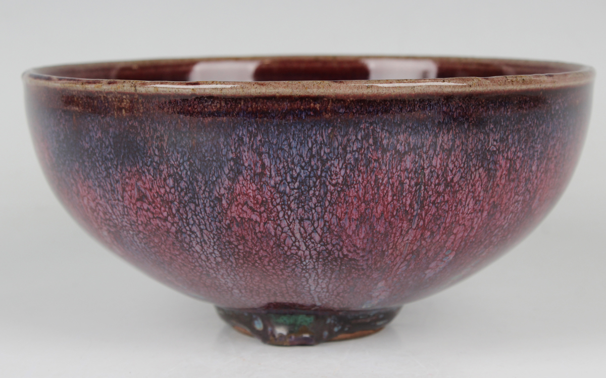 A Chinese flambé glazed porcelain bowl, Qing dynasty, the rounded sides rising to an everted rim - Image 7 of 18