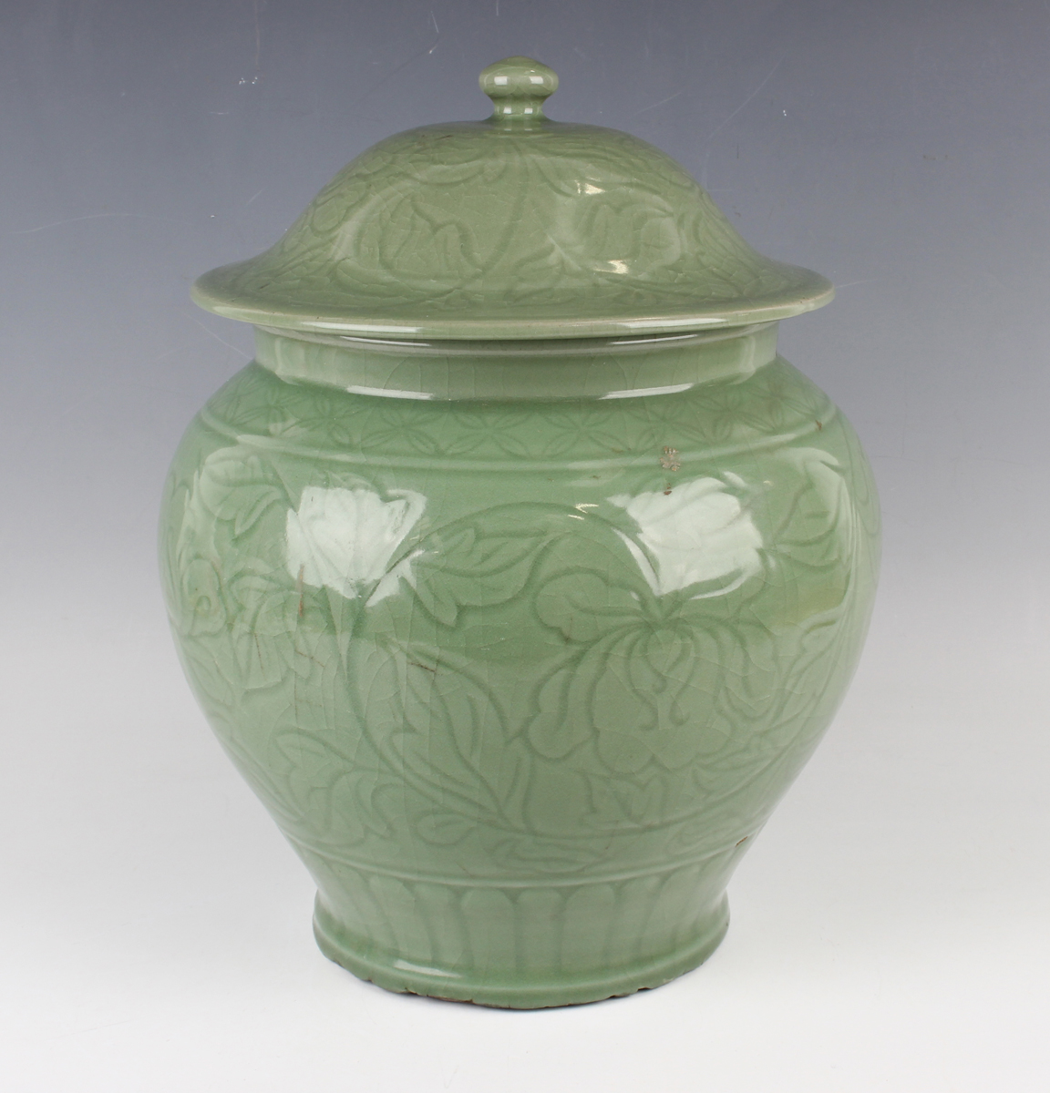 A Chinese carved celadon glazed jar and domed cover, Ming style but modern, carved in low relief - Image 8 of 11