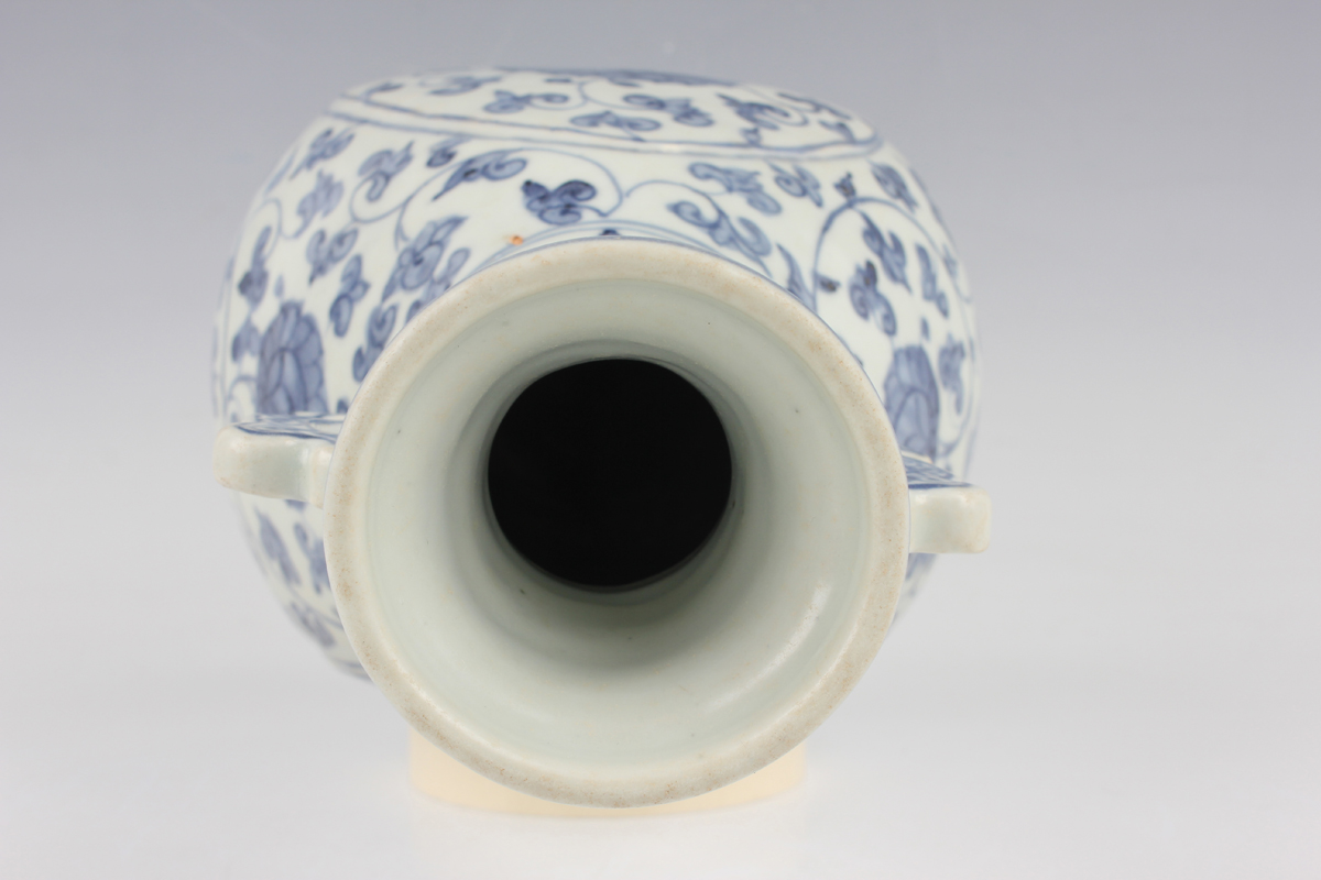 A Chinese Ming-style blue and white porcelain vase, the pear-form body painted with lotus and - Image 4 of 7