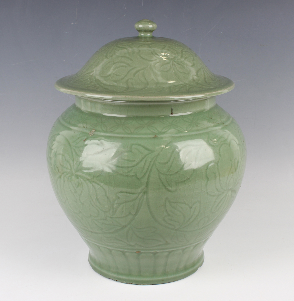 A Chinese carved celadon glazed jar and domed cover, Ming style but modern, carved in low relief - Image 9 of 11