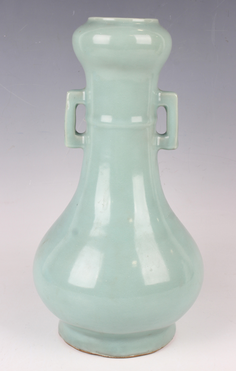 A Chinese celadon glazed porcelain bottle vase, probably late Qing dynasty, the pear form body - Image 5 of 6