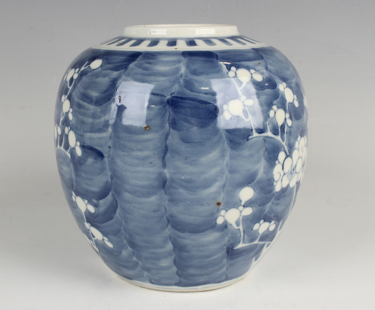 A Chinese blue and white porcelain 'phoenix tail' vase, late 19th century, painted with blossoming - Image 19 of 29